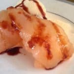 poached pears with chocolate sauce and ice cream